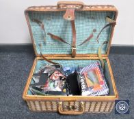 A wicker hamper containing a collection of Star Wars figures