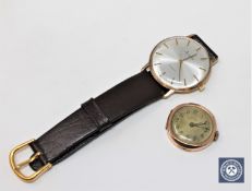 A gent's Accurist 9ct gold wristwatch on brown leather strap together with a lady's Star 9ct gold