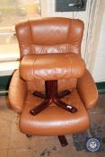A tan leather swivel relaxer chair and footstool on rosewood effect base