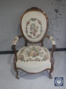 A continental carved walnut salon armchair