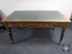A Victorian oak library table fitted three drawers