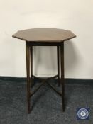 An Edwardian mahogany octagonal occasional table