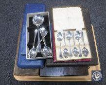 Eight boxes of silver plated cutlery, serving sets etc.