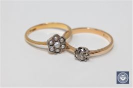 Two 18ct gold rings, one solitaire approximately 0.4ct, the other a pearl cluster.
