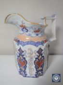 A Victorian Staffordshire earthenware jug in Imari colours,