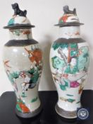 A pair of 20th century Chinese crackle glaze lidded baluster vases