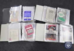 Four binders containing a very large quantity of 1960's and later football programmes,