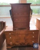 A walnut effect mirror backed dressing table and a four drawer chest