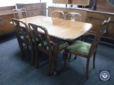 A mahogany Queen Anne style extending dining table with leaf,