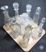 Eight various glass decanters with stoppers