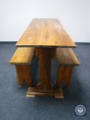 A pine refectory kitchen table together with two benches