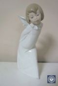 A Lladro figure of an angel, height 23.