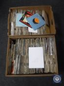 Two boxes containing a large quantity of 45 singles; The Beatles Rolling Stones,