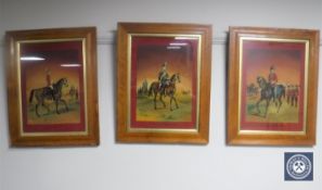 A set of three reverse paintings on glass after Ackerman's Costumes of the British Army;