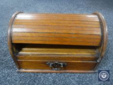 An oak roll top table box