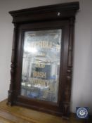A mahogany framed mirror with Mitchell's Old Irish Whisky advertising