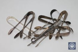 Eight pairs of Georgian silver sugar tongs,