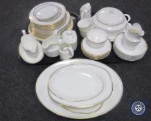 Approximately forty-six pieces of Royal Doulton Gold Concord porcelain dinner service