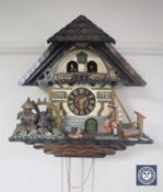 A cuckoo clock with weights