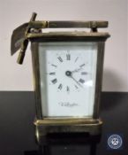 A brass cased Wellington carriage clock with key