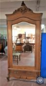 A 19th century French oak mirror door armoire CONDITION REPORT: Splits to base of