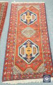 A Caucasian design runner on red ground,