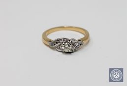 An 18ct gold diamond set ring,