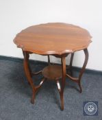 An Edwardian mahogany occasional table