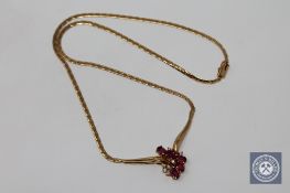 A fine quality 18ct gold ruby and diamond necklace, 12.4g.