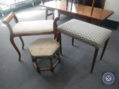 An early 20th century mahogany dressing table stool together with two further upholstered stools
