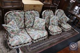 An Ercol three-piece lounge suite