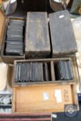 Four antique pine boxes of glass photographic negatives