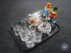 A tray of two Murano glass clowns, whisky glasses,