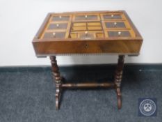 A late 19th century mahogany work table (top missing)