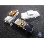 A Franklin Mint die-cast car - Rolls Royce Corniche V together with two other die-cast vehicles