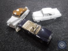 A Franklin Mint die-cast car - Rolls Royce Corniche V together with two other die-cast vehicles