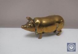 A small brass vesta in the form of a pig