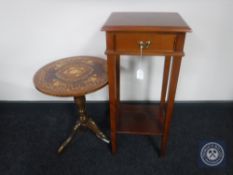 A yew wood telephone stand fitted a drawer together with an Italian style wine table