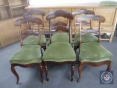 A set of five antique mahogany dining chairs on cabriole legs together with one other similar