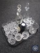A tray of assorted glass ware including two decanters,
