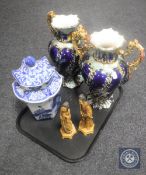A pair of ornate Majolica style twin handled vases, pair of Japanese figures,