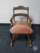 A Victorian mahogany child's rocking chair