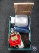 A box of glass and household wares