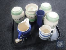 A tray of Wade White Horse Scotch Whisky jug, Cornish ware jug together with Denby pottery vase,