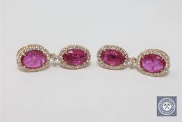 A pair of 14ct yellow gold ruby and diamond drop earrings featuring 4 rubies 4.