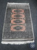 An Afghan design rug,