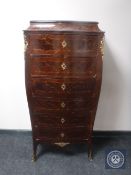 An ormolu mounted six drawer bombe chest, width 74 cm,