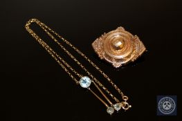 An aquamarine pendant on chain and a 19th century gold brooch CONDITION REPORT: The