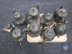 Nine antique pewter teapots