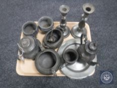A tray of antique pewter ware - candlesticks, planters, wall plates,